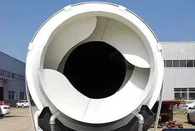 Self-loading mixer truck double-blade mixing system